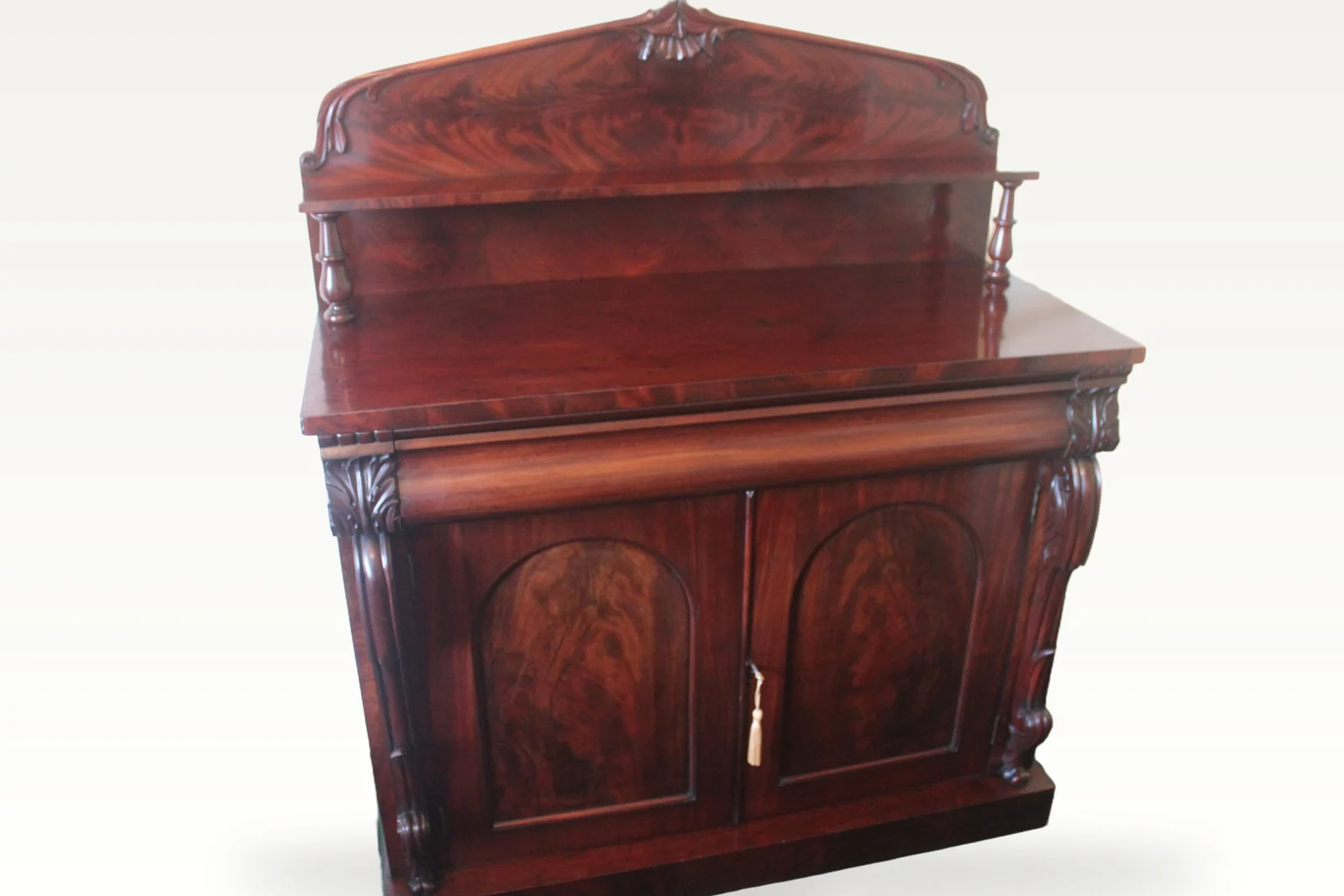 An early Victorian mahogany two-door chiffonier.