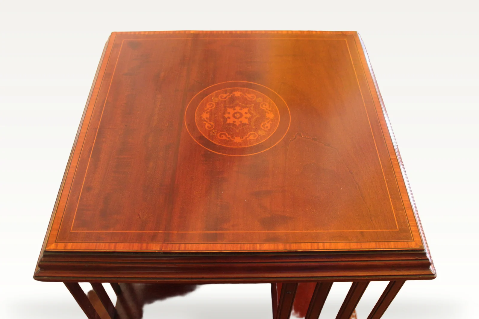 Edwardian mahogany and inlaid revolving bookcase — view 6