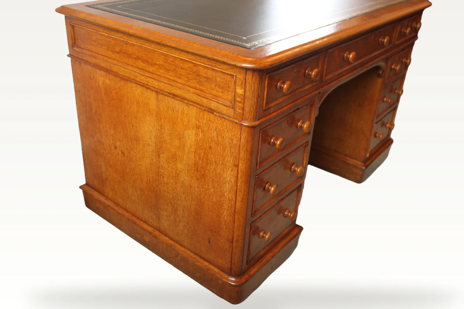 Victorian oak nine drawer pedestal desk by Edwards & Roberts — view 4