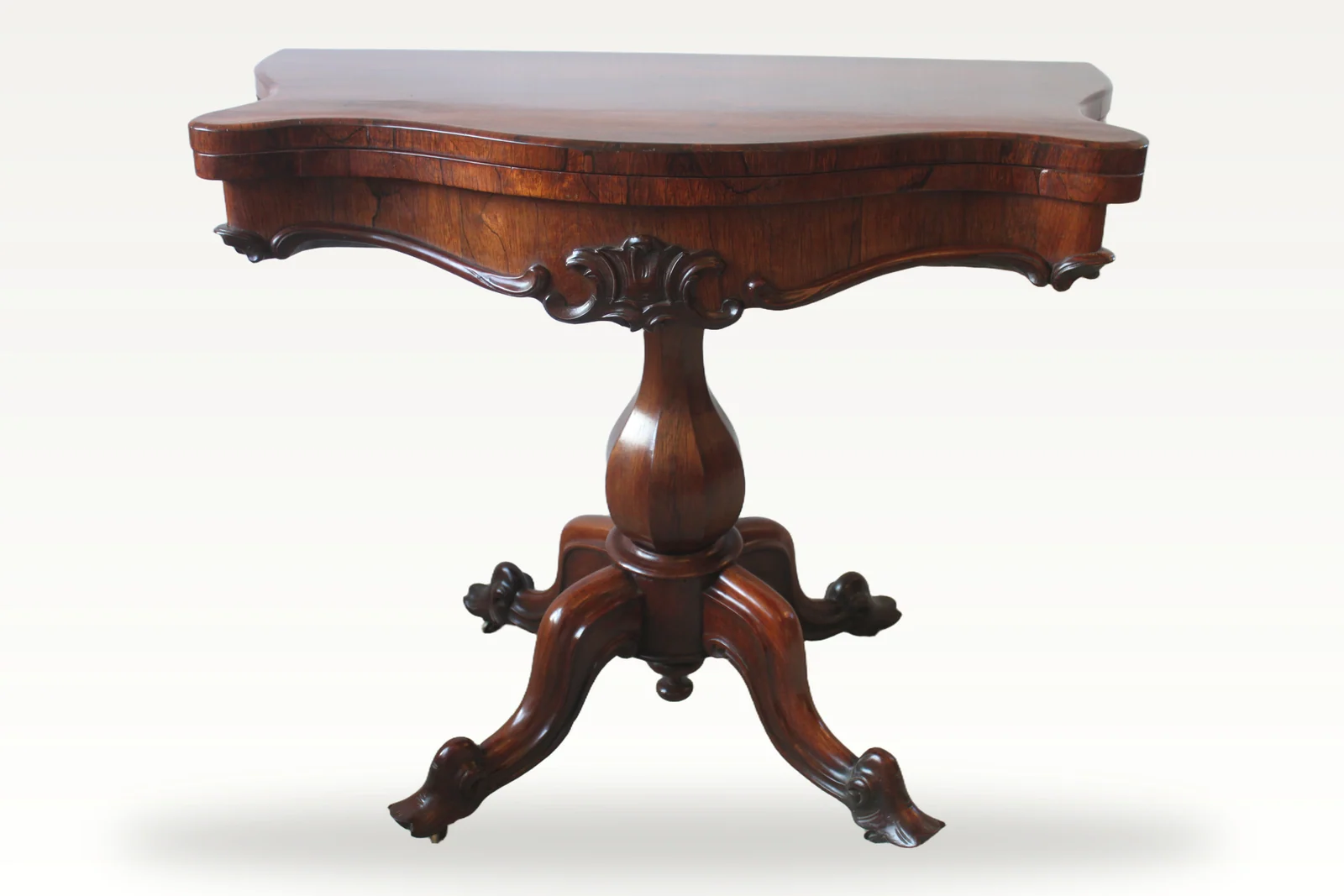 Victorian rosewood serpentine foldover tea table