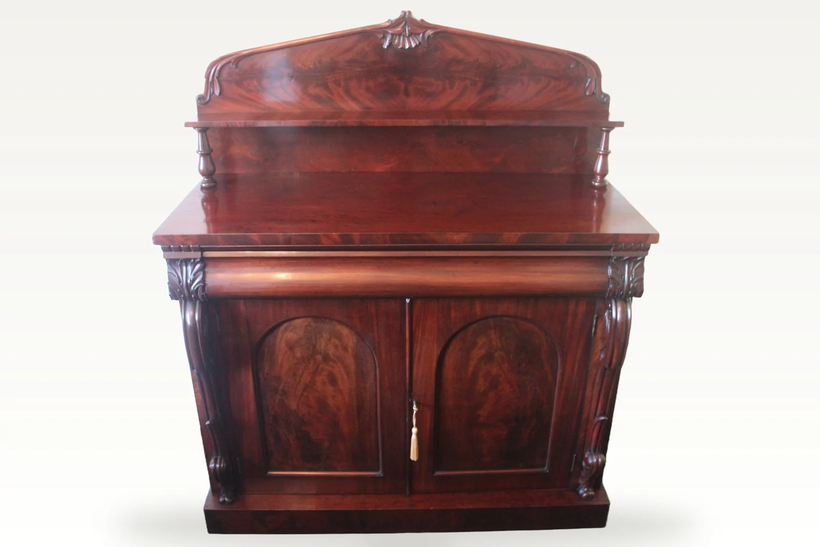 An early Victorian mahogany two-door chiffonier. — view 2