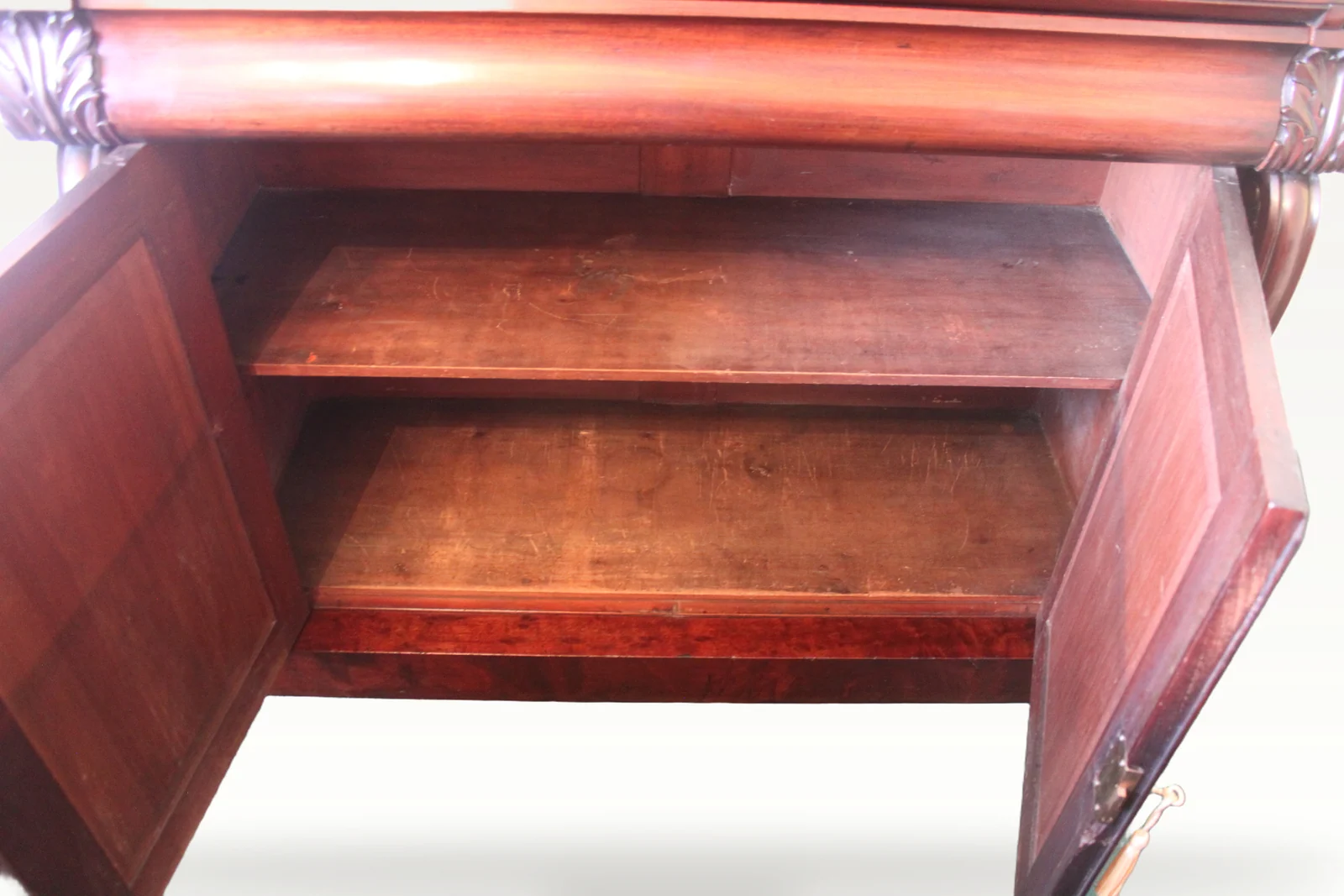 An early Victorian mahogany two-door chiffonier. — view 8