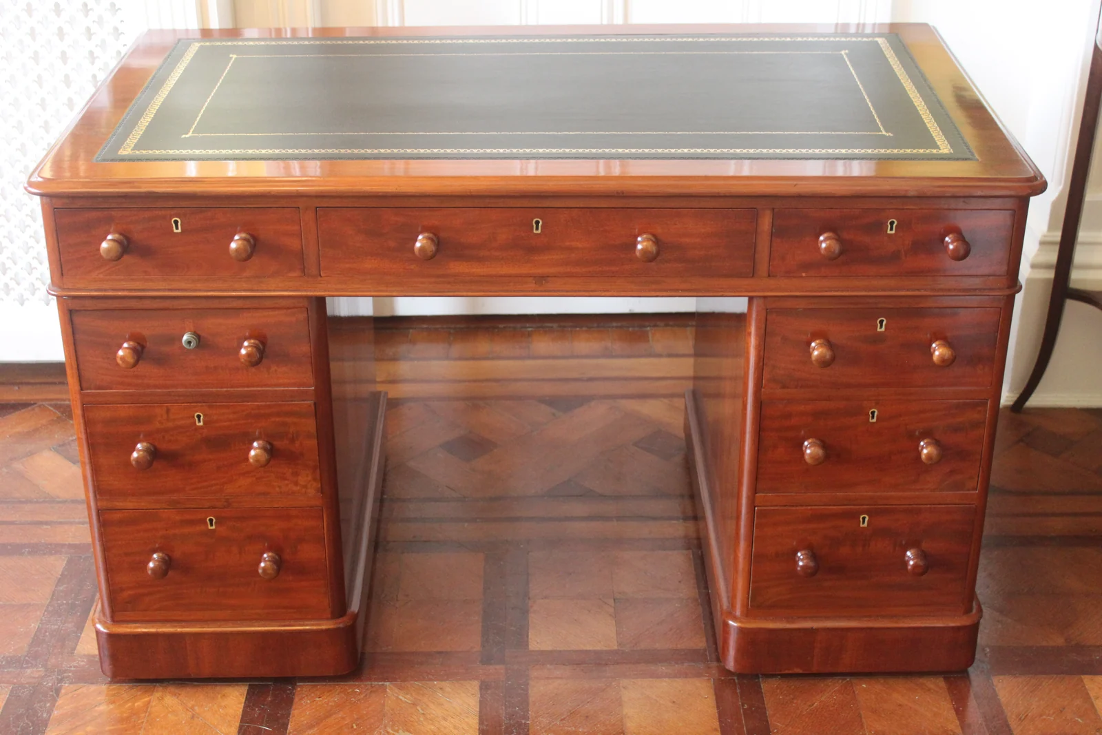 Victorian mahogany pedestal desk by Edwards & Roberts — view 2