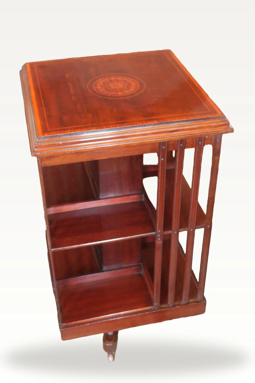 Edwardian mahogany and inlaid revolving bookcase — view 2