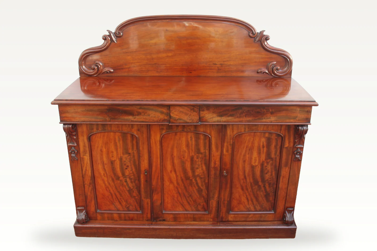 A mid Victorian mahogany three door chiffonier