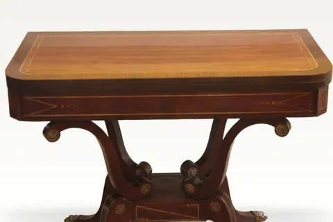 A fine Regency period mahogany brass inlaid fold-over card table