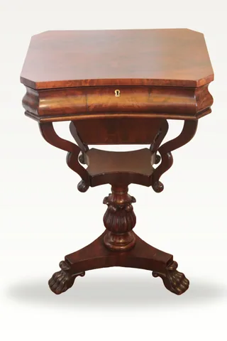 A lovely early Victorian curl grain mahogany sewing/work table