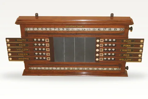 A rare mahogany billiard and Life Pool scoreboard