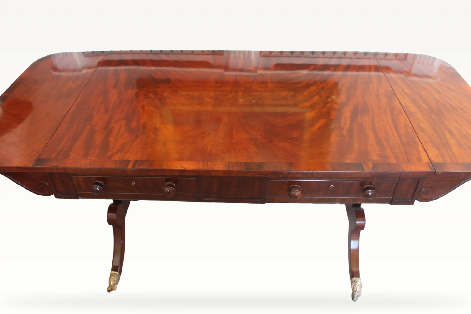 An early 19th Century mahogany sofa table — view 2