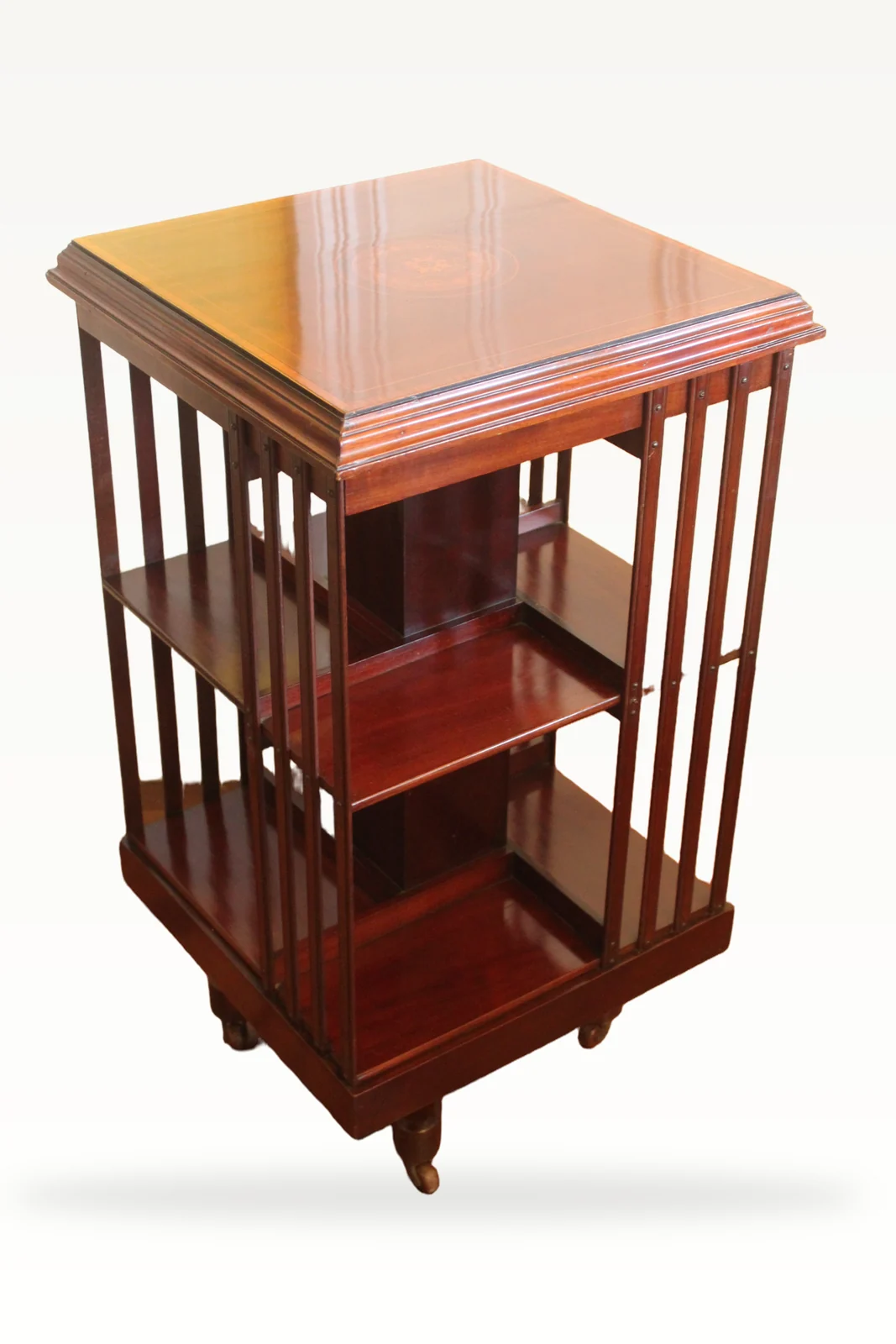 Edwardian mahogany and inlaid revolving bookcase — view 3